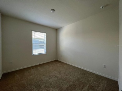 Enjoy Corner-Unit Townhouse with Golf Course Views -Davenport on Ridgewood Lakes Golf and Country Club in Florida - for sale on GolfHomes.com, golf home, golf lot