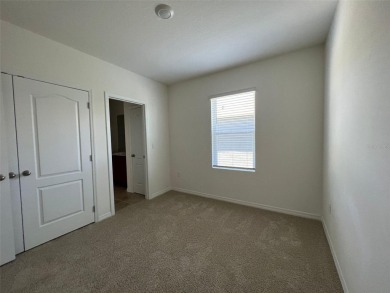 Enjoy Corner-Unit Townhouse with Golf Course Views -Davenport on Ridgewood Lakes Golf and Country Club in Florida - for sale on GolfHomes.com, golf home, golf lot
