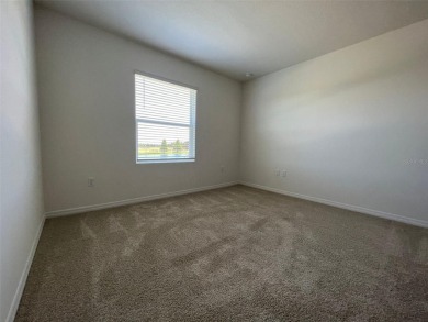 Enjoy Corner-Unit Townhouse with Golf Course Views -Davenport on Ridgewood Lakes Golf and Country Club in Florida - for sale on GolfHomes.com, golf home, golf lot
