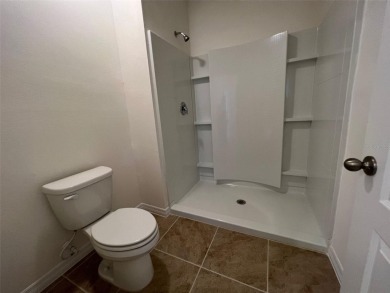 Enjoy Corner-Unit Townhouse with Golf Course Views -Davenport on Ridgewood Lakes Golf and Country Club in Florida - for sale on GolfHomes.com, golf home, golf lot
