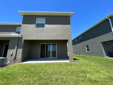 Enjoy Corner-Unit Townhouse with Golf Course Views -Davenport on Ridgewood Lakes Golf and Country Club in Florida - for sale on GolfHomes.com, golf home, golf lot