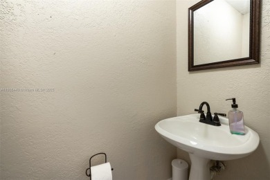 Welcome to this beautifully renovated 3 bed / 2.5 bath corner on Davie Golf Club in Florida - for sale on GolfHomes.com, golf home, golf lot