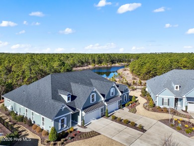 Welcome home to effortless coastal living in this move-in-ready on Members Club At St. James Plantation in North Carolina - for sale on GolfHomes.com, golf home, golf lot