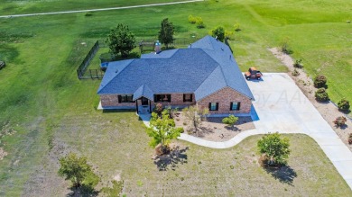 STUNNING HOME ON THE GOLF COURSE IN RIVER FALLS! You'll find on River Falls Par 3 Golf Course and Air Park in Texas - for sale on GolfHomes.com, golf home, golf lot