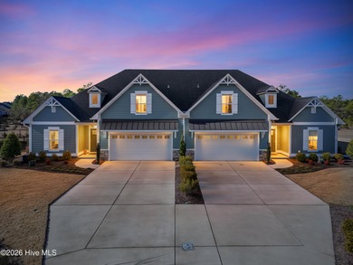 Welcome home to effortless coastal living in this move-in-ready on Members Club At St. James Plantation in North Carolina - for sale on GolfHomes.com, golf home, golf lot