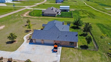STUNNING HOME ON THE GOLF COURSE IN RIVER FALLS! You'll find on River Falls Par 3 Golf Course and Air Park in Texas - for sale on GolfHomes.com, golf home, golf lot