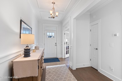 Welcome home to effortless coastal living in this move-in-ready on Members Club At St. James Plantation in North Carolina - for sale on GolfHomes.com, golf home, golf lot