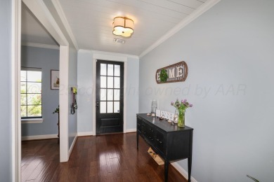 STUNNING HOME ON THE GOLF COURSE IN RIVER FALLS! You'll find on River Falls Par 3 Golf Course and Air Park in Texas - for sale on GolfHomes.com, golf home, golf lot