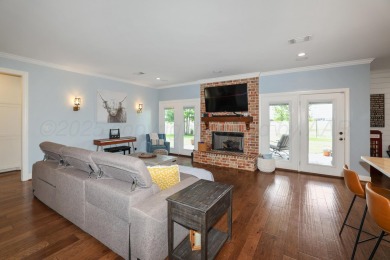 STUNNING HOME ON THE GOLF COURSE IN RIVER FALLS! You'll find on River Falls Par 3 Golf Course and Air Park in Texas - for sale on GolfHomes.com, golf home, golf lot