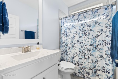 Welcome home to effortless coastal living in this move-in-ready on Members Club At St. James Plantation in North Carolina - for sale on GolfHomes.com, golf home, golf lot