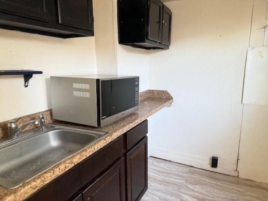 Duplex - each unit with 1 bedroom 1 bath. Central heat and air on Lozano Public Golf Center  in Texas - for sale on GolfHomes.com, golf home, golf lot