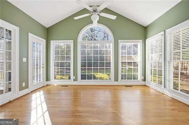 Tucked away on a quiet, double cul-de-sac street is the stately on Brookstone Golf and Country Club in Georgia - for sale on GolfHomes.com, golf home, golf lot