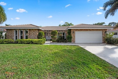 This spacious residence features 4 bedrooms, a den, and a formal on  in Florida - for sale on GolfHomes.com, golf home, golf lot