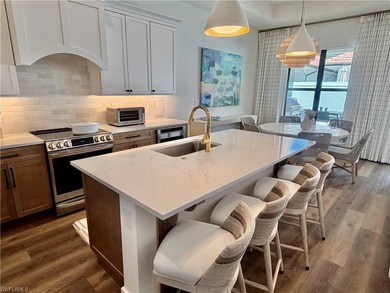 Located in the exclusive Cordoba neighborhood of Lely Resort on The Classics Country Club At Lely Resort in Florida - for sale on GolfHomes.com, golf home, golf lot