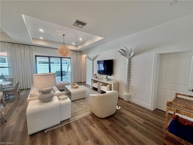 Located in the exclusive Cordoba neighborhood of Lely Resort on The Classics Country Club At Lely Resort in Florida - for sale on GolfHomes.com, golf home, golf lot