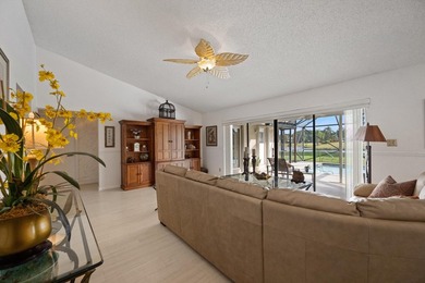 This spacious residence features 4 bedrooms, a den, and a formal on  in Florida - for sale on GolfHomes.com, golf home, golf lot