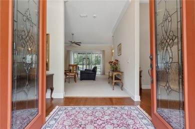 Step into a world of elegance and comfort with this timeless on Laurel Island Links in Georgia - for sale on GolfHomes.com, golf home, golf lot