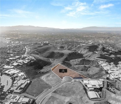 Perched 2,700 ft above the valley floor in double-gated Dragon's on Dragon Ridge Country Club in Nevada - for sale on GolfHomes.com, golf home, golf lot