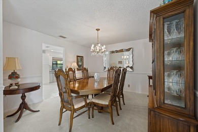 This spacious residence features 4 bedrooms, a den, and a formal on  in Florida - for sale on GolfHomes.com, golf home, golf lot