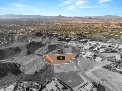 Perched 2,700 ft above the valley floor in double-gated Dragon's on Dragon Ridge Country Club in Nevada - for sale on GolfHomes.com, golf home, golf lot