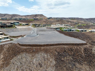 Perched 2,700 ft above the valley floor in double-gated Dragon's on Dragon Ridge Country Club in Nevada - for sale on GolfHomes.com, golf home, golf lot