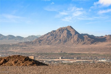 Perched 2,700 ft above the valley floor in double-gated Dragon's on Dragon Ridge Country Club in Nevada - for sale on GolfHomes.com, golf home, golf lot