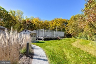 Welcome to 487 Eaton Way, an expanded and updated 2-bedroom on Hersheys Mill Golf Club in Pennsylvania - for sale on GolfHomes.com, golf home, golf lot