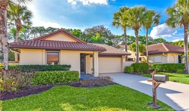 Lovely CBS 3 bedroom, 2 bath, 2 car garage split plan home with on Martin Downs Country Club in Florida - for sale on GolfHomes.com, golf home, golf lot