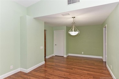 Lovely CBS 3 bedroom, 2 bath, 2 car garage split plan home with on Martin Downs Country Club in Florida - for sale on GolfHomes.com, golf home, golf lot