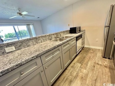 Welcome to the only 1-bedroom condo currently available in the on River Oaks Golf Plantation  in South Carolina - for sale on GolfHomes.com, golf home, golf lot
