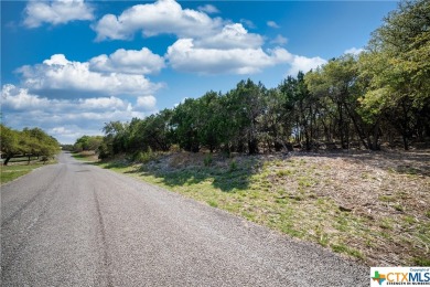 Tree shaded possible 2nd story lake view lot located in Canyon on Canyon Lake Golf Club in Texas - for sale on GolfHomes.com, golf home, golf lot
