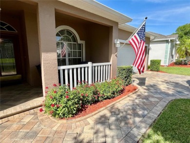 The Florida lifestyle at its finest! Lovely home on the golf on Kings Ridge Golf Club in Florida - for sale on GolfHomes.com, golf home, golf lot