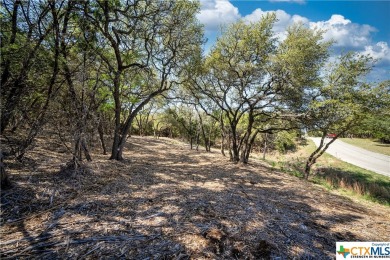 Tree shaded possible 2nd story lake view lot located in Canyon on Canyon Lake Golf Club in Texas - for sale on GolfHomes.com, golf home, golf lot