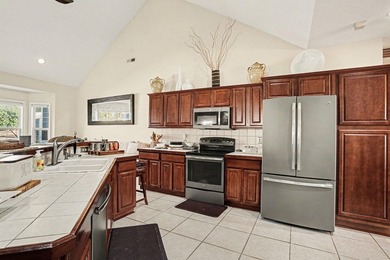 Spacious home nestled on a greatly sought after golf course of on Long Bay Club in South Carolina - for sale on GolfHomes.com, golf home, golf lot