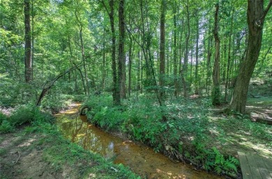 Location is everything in real estate and this home offers the on Dogwood Golf Club in Georgia - for sale on GolfHomes.com, golf home, golf lot