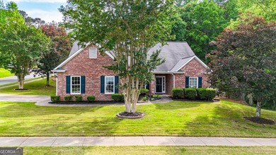 Welcome to this beautifully updated 3-bedroom, 2-bath stepless on Canongate At Eagle Watch Golf Club in Georgia - for sale on GolfHomes.com, golf home, golf lot