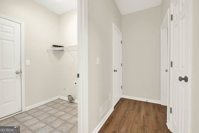 Welcome to this beautifully updated 3-bedroom, 2-bath stepless on Canongate At Eagle Watch Golf Club in Georgia - for sale on GolfHomes.com, golf home, golf lot