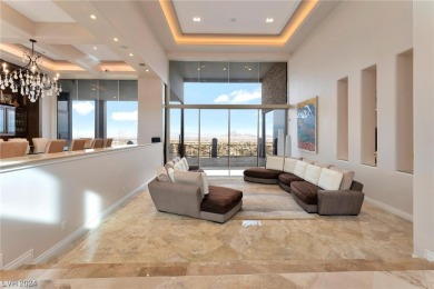Dazzling unobstructed Strip views overwhelm from this bilevel on Dragon Ridge Country Club in Nevada - for sale on GolfHomes.com, golf home, golf lot