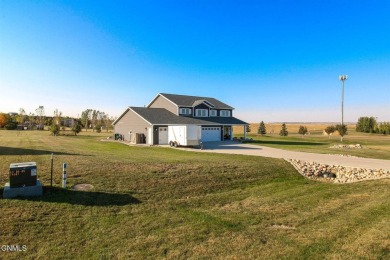 Stunning Whispering Ridge Home Near Hawktree Golf Course! on Hawktree Golf Club in North Dakota - for sale on GolfHomes.com, golf home, golf lot