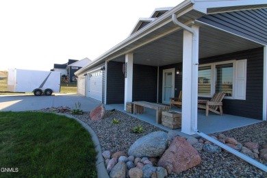 Stunning Whispering Ridge Home Near Hawktree Golf Course! on Hawktree Golf Club in North Dakota - for sale on GolfHomes.com, golf home, golf lot