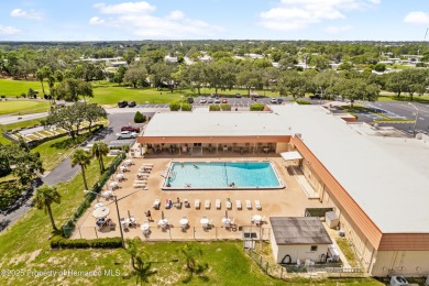 This 3 bedroom, 2 bath property is a lovely place to call homee on Brookridge Country Club in Florida - for sale on GolfHomes.com, golf home, golf lot