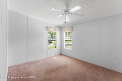 This 3 bedroom, 2 bath property is a lovely place to call homee on Brookridge Country Club in Florida - for sale on GolfHomes.com, golf home, golf lot