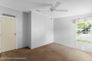 This 3 bedroom, 2 bath property is a lovely place to call homee on Brookridge Country Club in Florida - for sale on GolfHomes.com, golf home, golf lot
