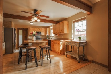 Bordered by the peaceful waters of Tenmile Creek, this 3.23-acre on Green Meadow Country Club in Montana - for sale on GolfHomes.com, golf home, golf lot