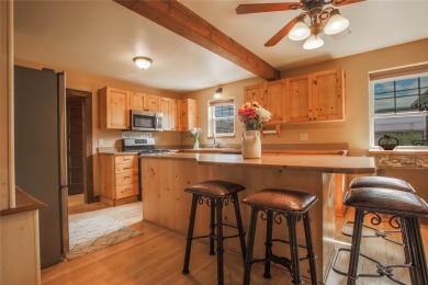 Bordered by the peaceful waters of Tenmile Creek, this 3.23-acre on Green Meadow Country Club in Montana - for sale on GolfHomes.com, golf home, golf lot