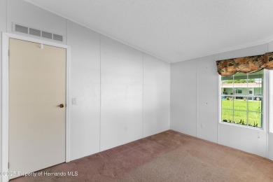 This 3 bedroom, 2 bath property is a lovely place to call homee on Brookridge Country Club in Florida - for sale on GolfHomes.com, golf home, golf lot