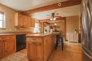 Bordered by the peaceful waters of Tenmile Creek, this 3.23-acre on Green Meadow Country Club in Montana - for sale on GolfHomes.com, golf home, golf lot