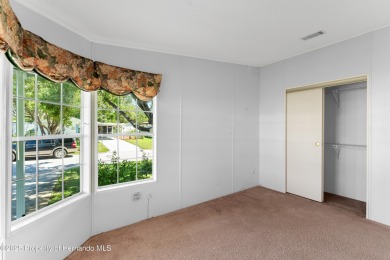 This 3 bedroom, 2 bath property is a lovely place to call homee on Brookridge Country Club in Florida - for sale on GolfHomes.com, golf home, golf lot