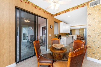 Breathtaking panoramic golf and pond views provide the perfect on Burnt Store Golf Club in Florida - for sale on GolfHomes.com, golf home, golf lot