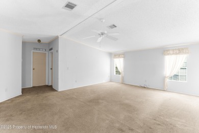 This 3 bedroom, 2 bath property is a lovely place to call homee on Brookridge Country Club in Florida - for sale on GolfHomes.com, golf home, golf lot